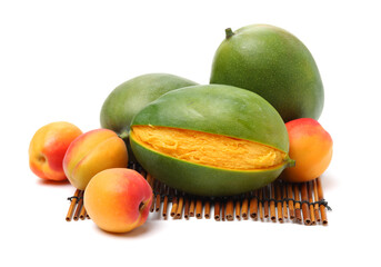mangos and apricot on a white background 