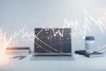 Double exposure of abstract creative financial chart on modern laptop background, research and strategy concept