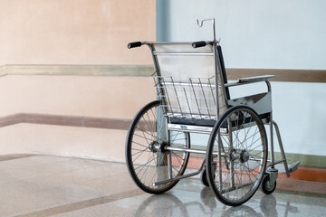 Fototapeta na wymiar stainless steel wheel chairs in hospital. Hospital trolley wheelchair.