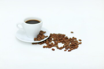 Coffee cup and beans on a white background.