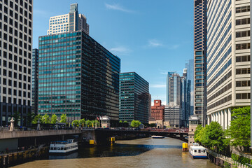 Several skyscrapers on the embankment of South Branch Chicago river and a bridge