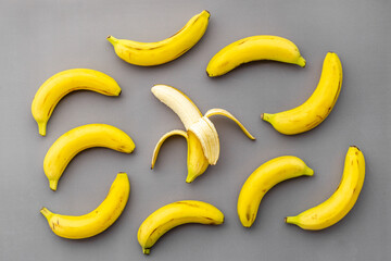 Half peeled banana with other fruits. Top view