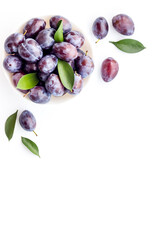 Layout set of ripe purple plums. Top view