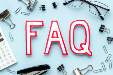 Information helpdesk concept with faq frequently asked questions text on working place