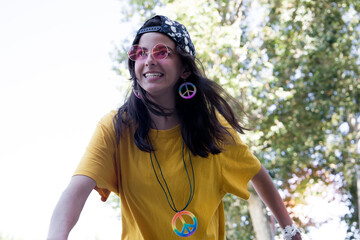 Stylish hippie girl doing sports in the park