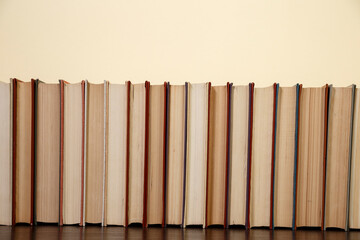 Composition with vintage old hardback books, diary, fanned pages