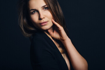 girl brunette beauty model in a black jacket