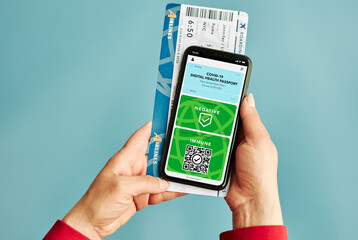 Digital covid certificate. Covid negative rapid digital test pass. Woman passenger holding digital medical pass on her mobile phone and airplane ticket. Traveler showing digital covid test result