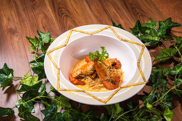 chinese banquet stir fried noodle with cheese creamy sauce and big tiger prawn asian halal menu