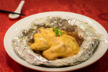 chinese steam healthy herbal chicken soup in red chinese new year background asian halal menu