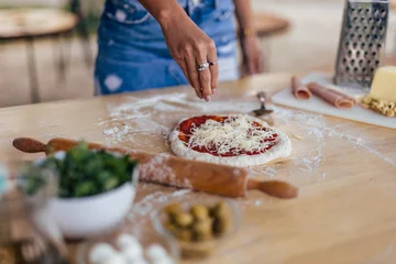 Foto op Canvas Adult woman, making an Italian pizza. © bnenin