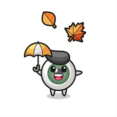 cartoon of the cute eyeball holding an umbrella in autumn