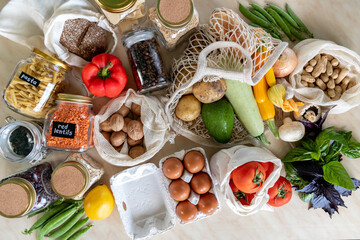 Eco-friendly store purchases packed mesh bags and glass jars. Zero waste concept.