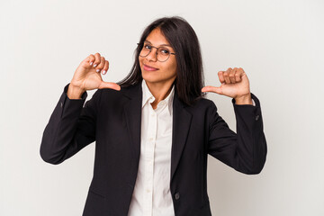 Young business latin woman isolated on white background feels proud and self confident, example to...