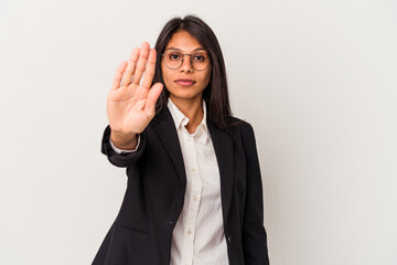 Young business latin woman isolated on white background standing with outstretched hand showing...