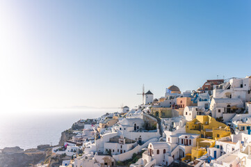 Fototapeta na wymiar Santorini, Cyclades Islands, Greece. White houses and churches in summer