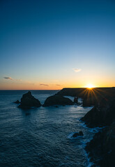 sunset over the sea at Kynance cove , Cornwall ,U.K 