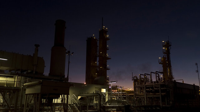 Remote gas plant at sunset