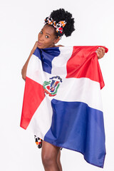 Latina woman playfully holding the Dominican Republic flag