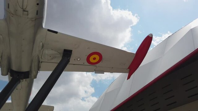 Bottom view of the Aeronave Hispano Aviaci&oacute;n HA-200D located next to the Wanda Metropolitano stadium, as a tribute to Atl&eacute;tico-Aviaci&oacute;n, currently the Atletico de Madrid soccer team