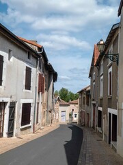Fototapeta na wymiar view down a traditional French Street at Lussac France 