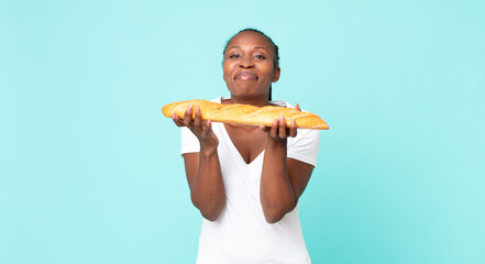 black african american adult woman holding a baguette