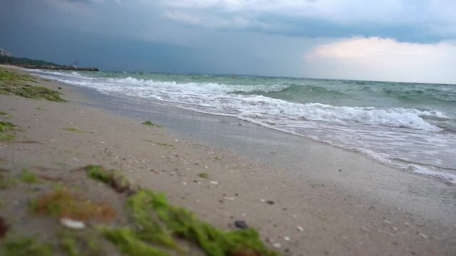 dark storm clouds over the sea beach. Beaches without people