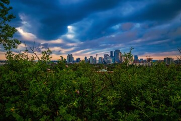 Fototapeta na wymiar Moody Clouds Over The Downtown Calgary Skyline In The Summertime