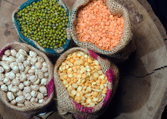 Yellow split peas, Green gram, Chickpeas, and Lentils in sacks
