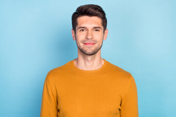 Photo of young handsome business man happy positive smile wear casual jumper isolated over blue...