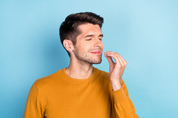 Profile side photo of young man happy positive smile show finger perfect tasty great sign chef...