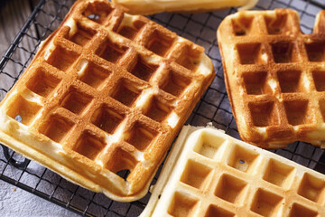 Close-up of fresh homemade waffles on grid