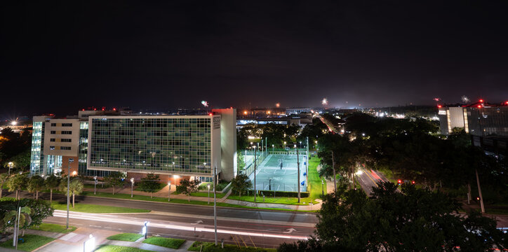 St Petersburg, FL, USA - 07 04 2021: Fireworks and night landscape of  in St Petersburg, Florida