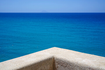 turquoise Tyrrhenian Sea and Stromboli volcanic island seen from the viewpoint of Sanctuary of...