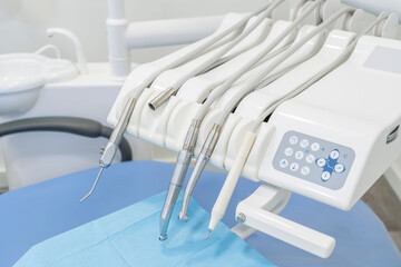 Modern dental equipment, chair instruments and tools.
