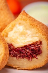 Coxinha close up carne seca