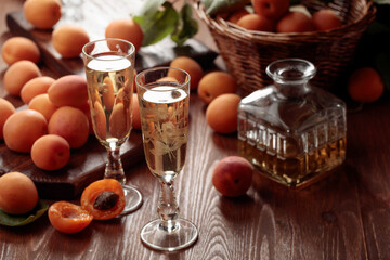 Fototapeta na wymiar Apricot liquor with fresh fruits.