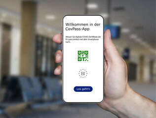 Stuttgart,Baden Württemberg , Germany-2021 Vaccination passport application in Germany. Vaccination passport application. a phone in hand and the covpass app on its screen 3d illustration