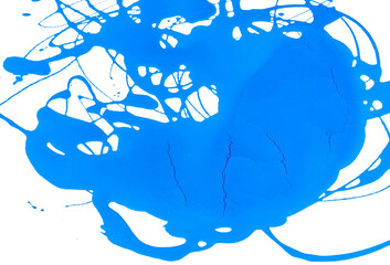 A blot of blue paint on paper, with dry zones starting to break.
