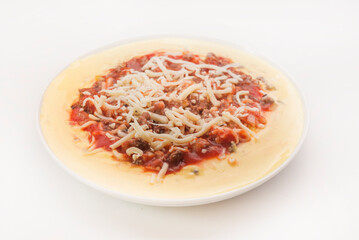 Polenta with tomato, cheese and mince