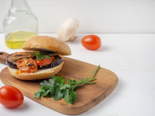 Vegetarian burgers made of eggplant, mushrooms, cucumbers, tomatoes and herbs.