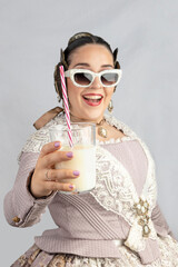 Young Valencian fallera promotes horchata de chufa
