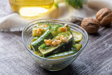 Green zucchini salad with walnuts and dill