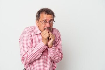 Middle aged indian man isolated on white background scared and afraid.