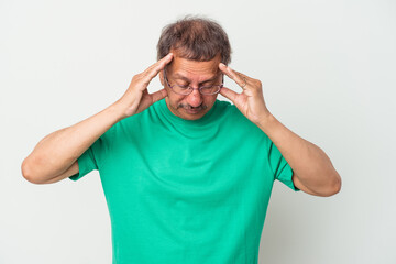 Middle aged indian man isolated on white background touching temples and having headache.