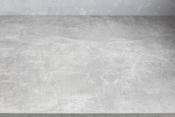 Grey table top and  wall background texture. Front view of tabletop and wall - 445213491