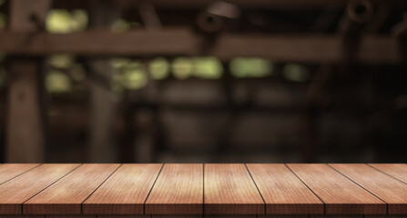 wooden top table on blur carpenter shop background