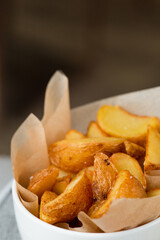 fries potato closeup with craft paper. idaho potatoes closeup