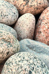 Natural stones. The texture of stones of different sizes and colors. Stone background.