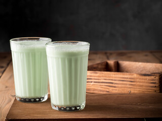 Traditional Indian drink Bhang Lassi, with hemp leaves.